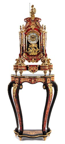 A Louis XIV Style Simulated Boulle Marquetry Clock and Stand Height of clock 43 inches; height of stand 39 inches.