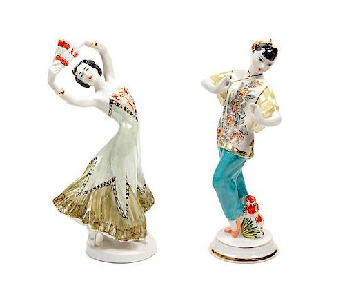 Two Russian Porcelain Figures Height 11 inches.