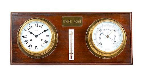 An English Ship's Chronometer and Barometer Height 10 1/8 x width 23 7/8 inches.