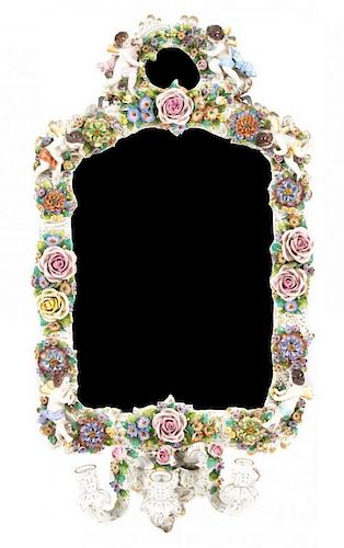 A Capodimonte Style Mirror Height 33 3/4 x width 17 3/4 inches.