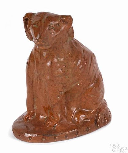 Pennsylvania redware figure of a seated dog, 19th c., 6'' h.