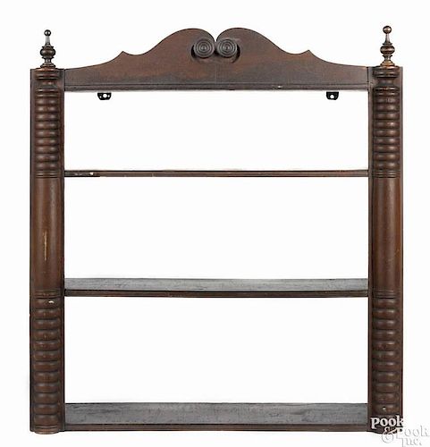 Fanciful Pennsylvania painted pine hanging shelf, ca. 1840, with half turned pilasters