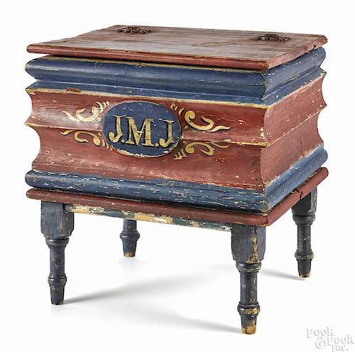 Carved and painted stool, ca. 1900, with a lift lid compartment, initialed J.M.J., 14 3/4'' h.