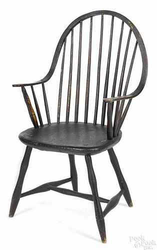 New England continuous arm Windsor chair, ca. 1815, retaining an old varnish surface, 35'' h.
