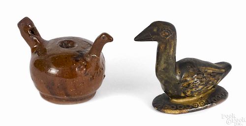 Pennsylvania redware bird whistle, 19th c., 2 1/4'' h., together with a figure of a goose
