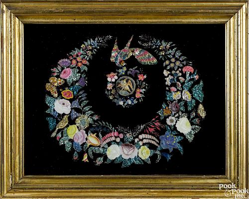 Victorian reverse painted and applied tinsel on glass floral garland centering on an exotic bird