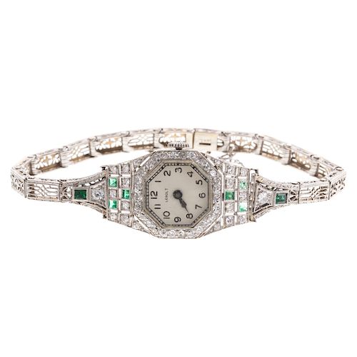 An Art Deco Diamond & Emerald Watch in Platinum