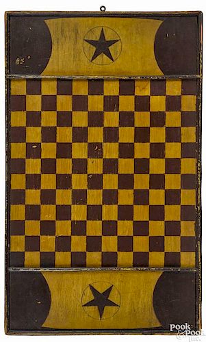 American painted pine gameboard, late 19th c., retaining its original yellow and maroon surface
