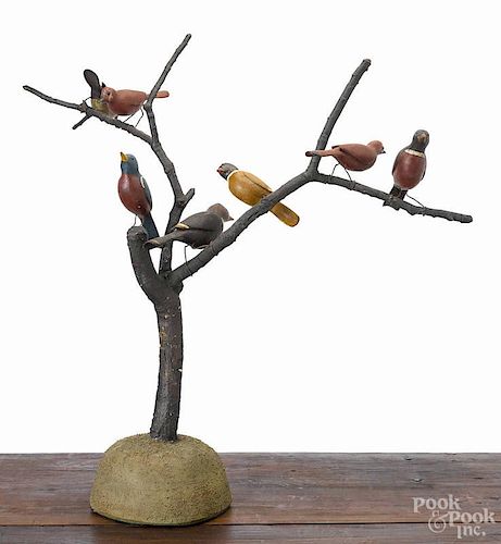 Maine carved and painted bird tree, early 20th c., with seven polychrome decorated song birds