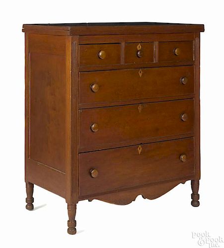Pennsylvania Sheraton cherry chest of drawers, ca. 1820, retaining an old red stained surface