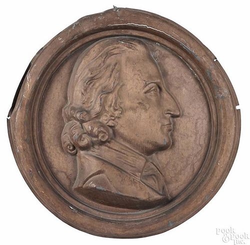 Pair of painted zinc portrait medallions, one likely George Washington, 19th c., 21'' dia.