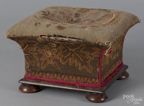 Mahogany footstool, 19th c., with needlework upholstery, 8'' h., 12'' w., 12'' d.