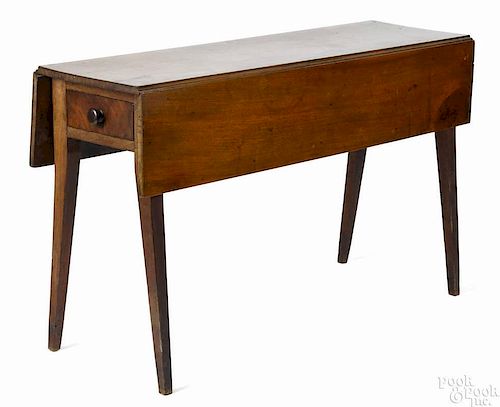 Pennsylvania walnut dropleaf work table, early 19th c., with two drawers and splayed, square legs