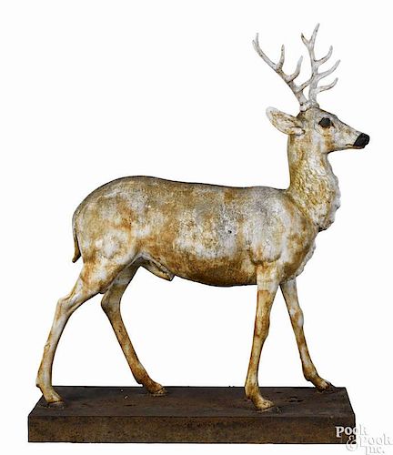 Cast iron garden figure of a stag, 19th c., by J. W. Fiske & Co., 62 1/2" h., 48" l.
