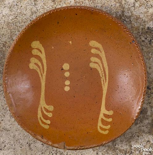 Johnsonville, Pennsylvania redware pie plate, 19th c., with yellow slip decoration, stamped verso