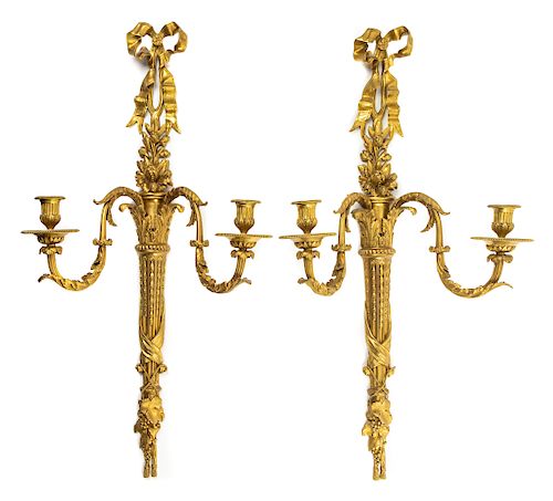 A Pair of Louis XVI Style Gilt Bronze Two-Light Sconces Height 31 inches.