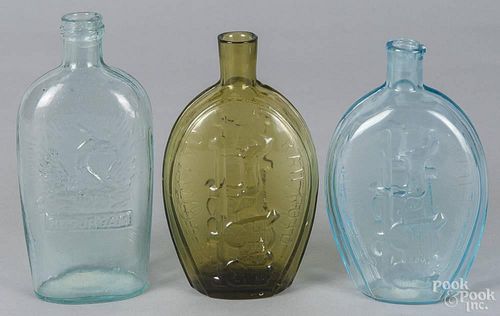 Three contemporary glass flasks, 7 1/2'' h., 7'' h., and 6 3/4'' h.