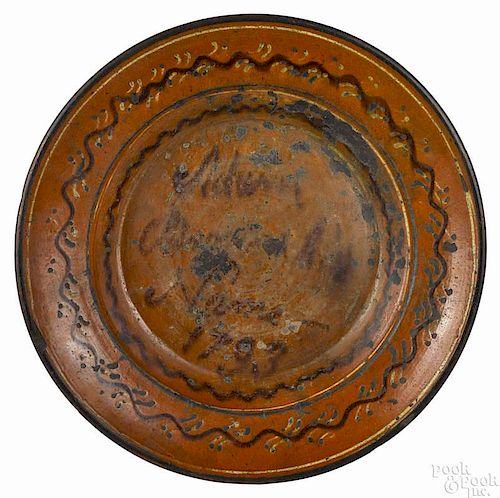 Moravian redware charger, dated 1793, with partially legible slip inscription