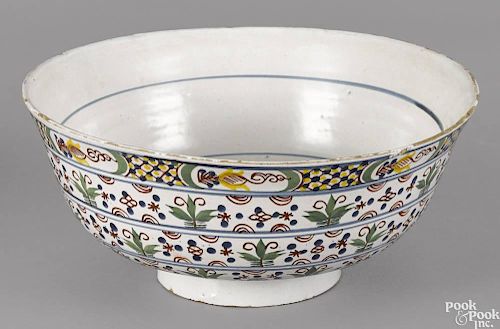 London Delft tin glazed earthenware punch bowl, mid 18th c., with polychrome floral bands