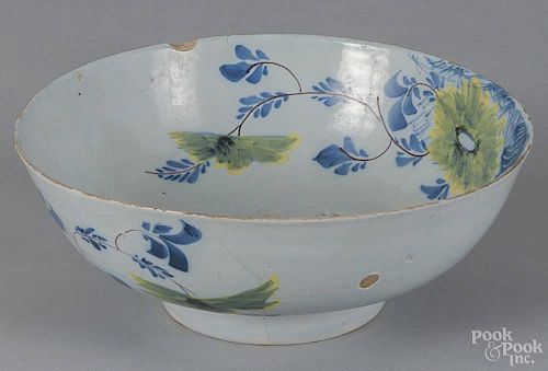 English Delft tin glazed Fazackerly bowl, mid 18th c., with overall floral decoration, 4'' h.