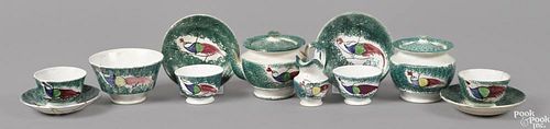 Teal miniature spatter tea service, 19th c., with peafowl decoration, to include a teapot