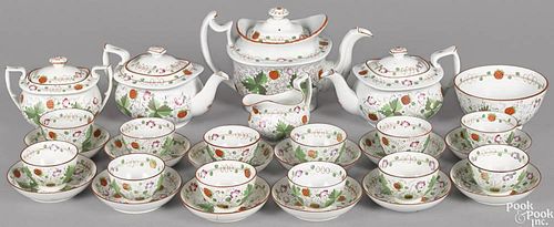 English pearlware strawberry pattern tea and coffee service, early 19th c., to include a coffee pot