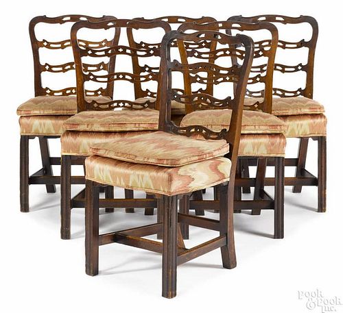 Set of six George III mahogany ribbonback dining chairs, ca. 1780, with over-upholstered seats