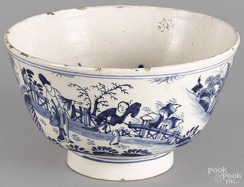 Dutch Delft blue and white bowl, ca. 1730, the outside decorated with chinoiserie scenes