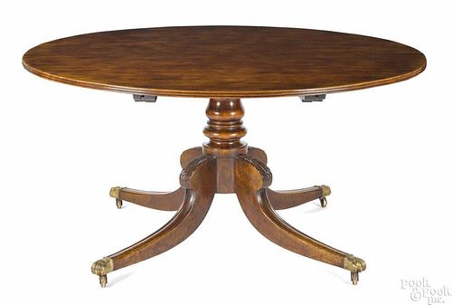 Regency-style mahogany pedestal dining table, early 20th c., together with two leaves, 29'' h.
