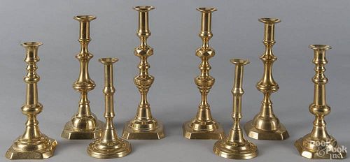 Four pairs of English brass candlesticks, 19th c., tallest - 11 3/4''.
