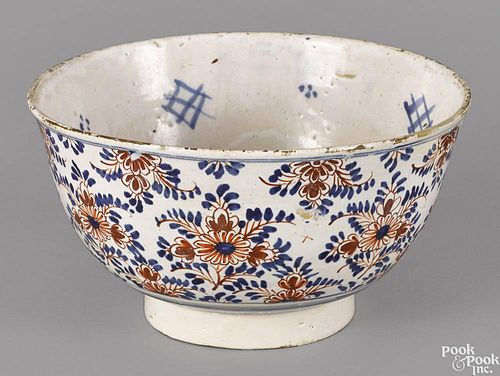 English Delft tin glazed earthenware bowl, mid 18th c., with red and blue floral decoration