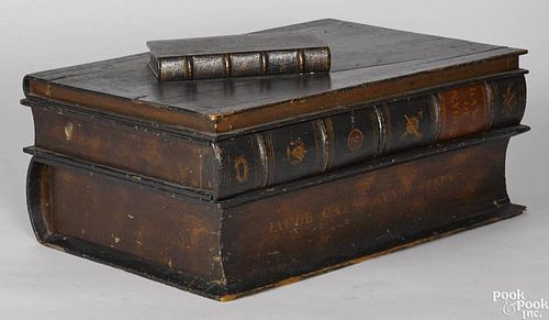 Carved and painted book-form box, 19th c., the box carved to resemble a stack of four books