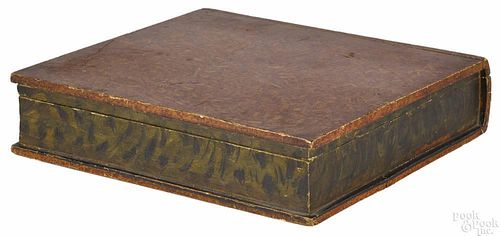 Carved and painted pine book-form box, 19th c., with a sponge decorated body