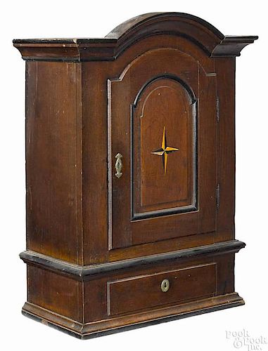 Continental oak hanging cupboard, ca. 1760, with a star inlaid door, 37'' h., 23'' w.
