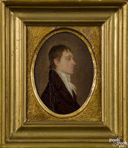 Jacob Eicholtz (American 1776-1842), pair of oil on board oval portraits of a husband and wife