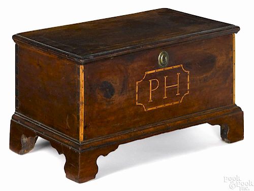 Miniature Pennsylvania cherry blanket chest, ca. 1800, initialed PH, with banded inlaid edges