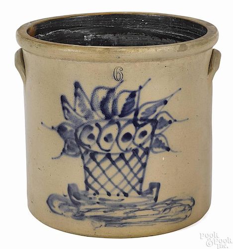 Stoneware six-gallon crock, 19th c., with a latticed basket of flowers, 13'' h.