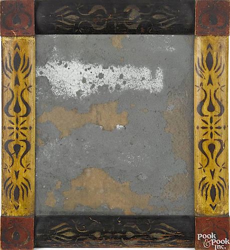 Pennsylvania mirror, 19th c., with a stencil decorated frame having yellow and black half columns