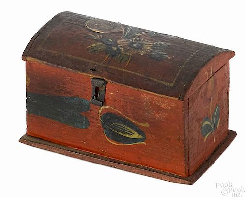 Painted pine trinket box, 19th c., retaining its original floral decoration on a red ground