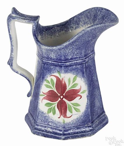 Blue spatterware cluster of buds cream pitcher, 19th c., 5 1/2'' h.