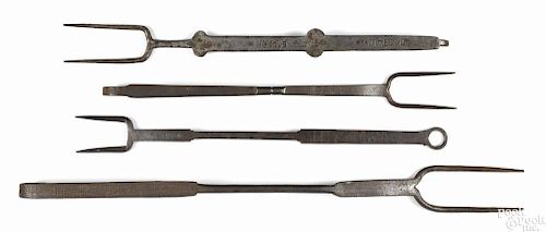 Four wrought iron forks, 19th c., inscribed on handle Martlis Eiler, 19'' l.
