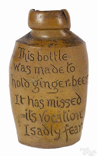 Whimsical English stoneware beer bottle, 19th c., impressed Elliot London