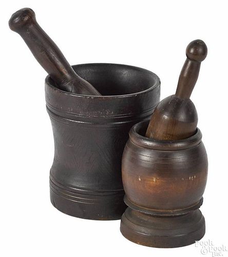 Two turned wood mortar and pestles, 19th c., 8 1/4'' h. and 6 3/4'' h.