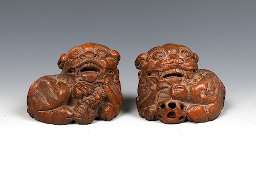 PAIR OF CHINESE BAMBOO 'BUDDHIST LION' CARVINGS