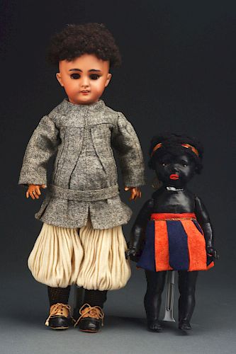 Pair of Black Bisque DEP and Heubach Dolls.