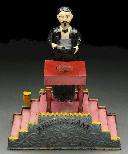 J. & E. Stevens Magician Cast Iron Mechanical Bank with Original Box.