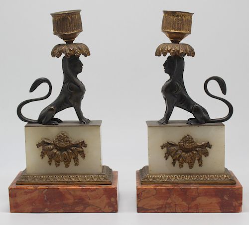 Pair of Patinated and Gilt Bronze Egyptian Revival