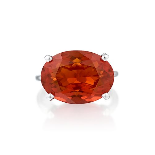 A Vibrant Fire Opal and Diamond Ring
