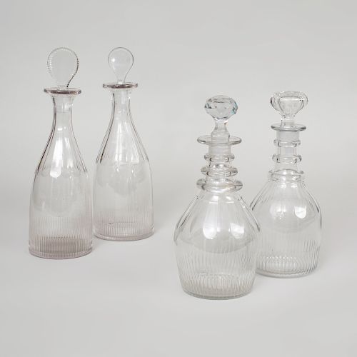 Two Pairs of Cut Glass Decanters and Four Stoppers