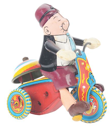 Japanese Tin Litho and Celluloid Wind Up Wimpy on Tricycle Toy.
